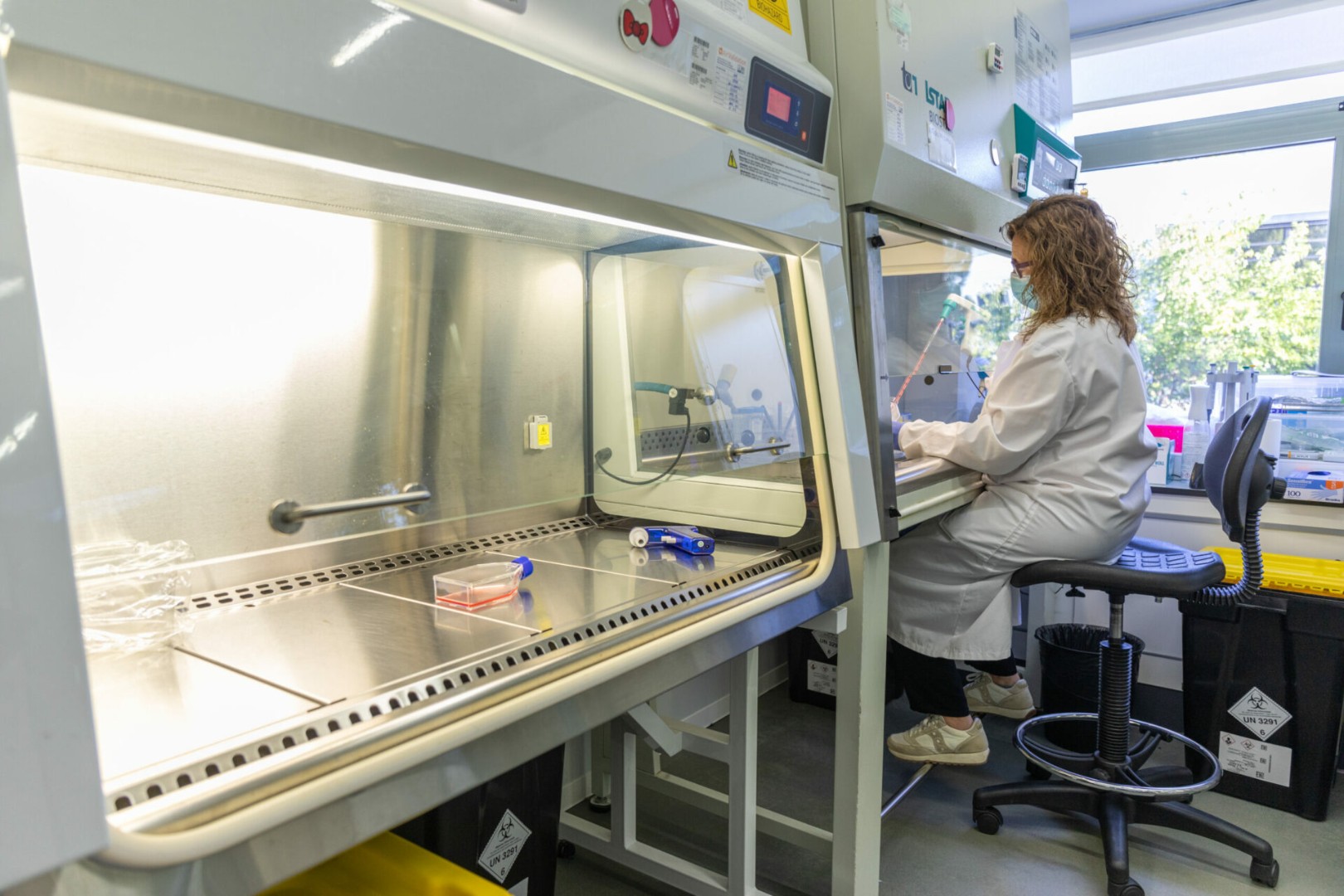 woman working in the kymos group laboratory